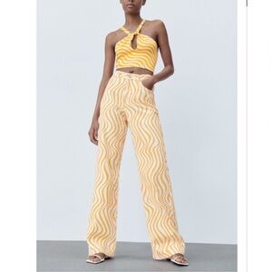Zara high-rise wide-leg jeans in an orange and white wavy swirl print